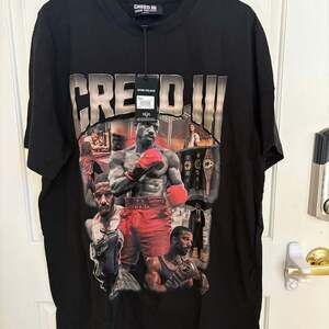 Shoe Palace x CREED lll ROAR WASHED T-Shirt